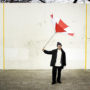 Poor, Sad Todd - Photographer Heather Johnson snagged this incredibly revealing shot of Todd, at his poorest and saddest. Look at him, standing alone, holding a broken umbrella in the middle of an abandoned handball court. Don't you wish you could turn back the hands of time, and hand Todd your non-broken umbrella, then saunter over to a nearby cafe for the coffee beverage of your choice? This photograph underscores the notion that show business is not always glamorous, especially for a tortured soul like Todd.
